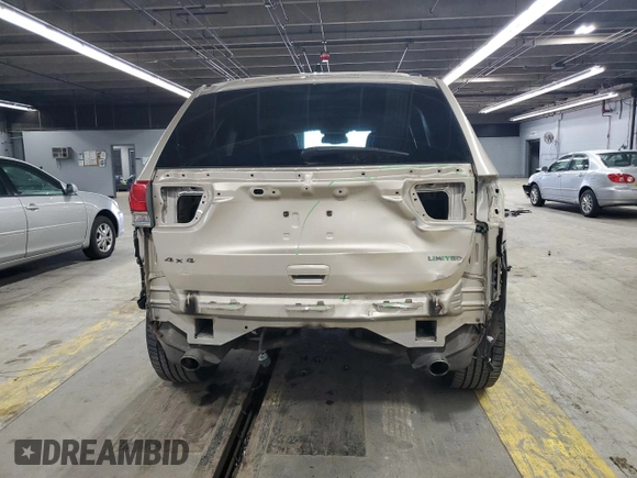 2014 Jeep Grand Cherokee Limited z VIN 1C4RJFBG1EC148908, wystawiony jako Copart lot #54311675 z przebiegiem 90 886 mil mil oraz Szkoda całkowita • Salvage title. Historia ofert i sprzedaży dostępna na DreamBid. Obrazek 6.