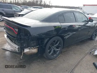2020 Dodge Charger SXT with VIN 2C3CDXBG0LH237970, listed as a IAAI auction lot 41088945 with 106,674 mi miles and . Bid and sale history available at DreamBid. Image 4.