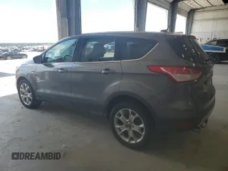 2013 Ford Escape SEL with VIN 1FMCU9H93DUA35005, listed as a Copart auction lot 63867005 with 209,362 mi miles and Clean title. Bid and sale history available at DreamBid. Image 2.