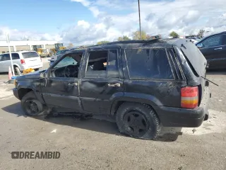 1998 Jeep Grand Cherokee Laredo with VIN 1J4GZ58S6WC305902, listed as a Copart auction lot 75988244 with 0 mi miles and Clean Title. Bid and sale history available at carsss.com. Image 2.