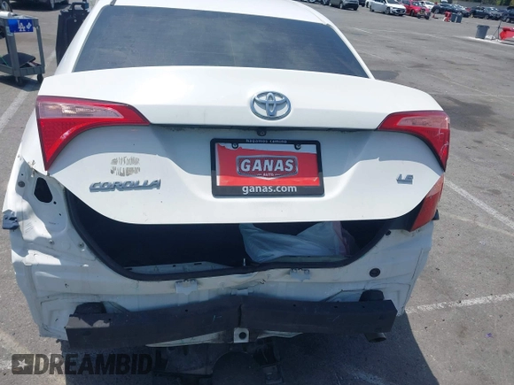 2018 Toyota Corolla L with VIN 5YFBURHE7JP810444, listed as a IAAI auction lot 42558647 with 74,794 mi miles and . Bid and sale history available at DreamBid. Image 6.