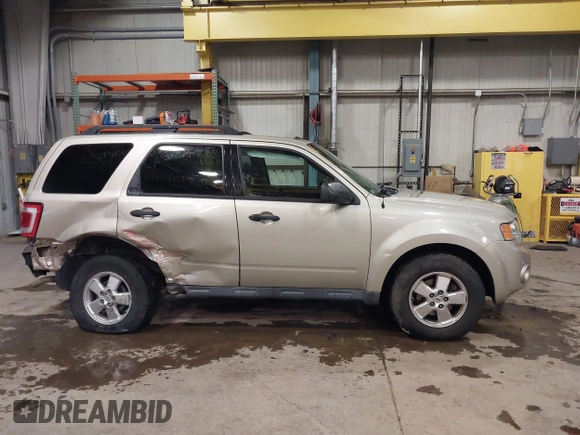 2011 Ford Escape XLT with VIN 1FMCU0D75BKB11168, listed as a IAAI auction lot 41327470 with 136,610 mi miles. Bid and sale history available at carsss.com. Image 14.