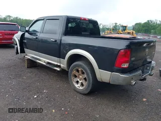 2009 Dodge 1500 Laramie z VIN 1D3HV13T69S799484, wystawiony jako IAAI lot #42312702 z przebiegiem 254 233 mil mil oraz . Historia ofert i sprzedaży dostępna na DreamBid. Obrazek 3.