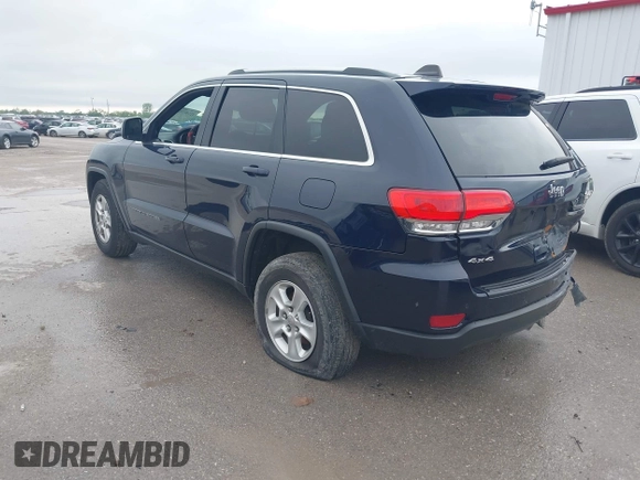 2017 Jeep Grand Cherokee Laredo with VIN 1C4RJFAGXHC912454, listed as a IAAI auction lot 42140735 with 138,895 mi miles and . Bid and sale history available at DreamBid. Image 3.