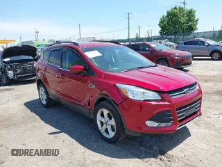 2016 Ford Escape SE z VIN 1FMCU9GX1GUC04815, wystawiony jako IAAI lot #42235499 z przebiegiem 84 713 mil mil oraz . Historia ofert i sprzedaży dostępna na DreamBid. Obrazek 1.