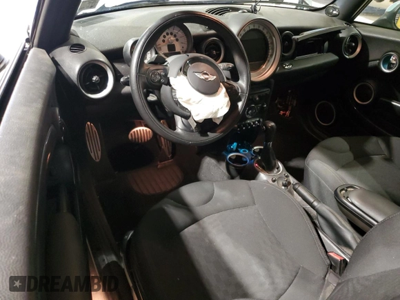 2014 MINI Convertible S с VIN WMWZP3C59ET707581, выставлен на аукционе Copart как лот 46983865 с пробегом 42 746 миль миль и Списание • Salvage title. История ставок и продаж доступна на DreamBid. Изображение 8.