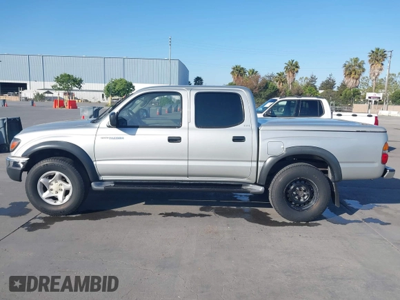 2003 Toyota Tacoma PreRunner z VIN 5TEGN92N63Z152916, wystawiony jako IAAI lot #42153765 z przebiegiem 229 221 mil mil oraz . Historia ofert i sprzedaży dostępna na DreamBid. Obrazek 14.
