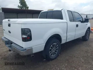 2004 Ford F-150 XLT with VIN 1FTRX12594KD71332, listed as a IAAI auction lot 42138488 with 170,234 mi miles. Bid and sale history available at carsss.com. Image 4.