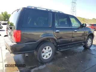 2002 Lincoln Navigator z VIN 5LMFU28R42LJ11223, wystawiony jako Copart lot #57127995 z przebiegiem 170 321 mil mil oraz Szkoda całkowita • Salvage title. Historia ofert i sprzedaży dostępna na DreamBid. Obrazek 3.