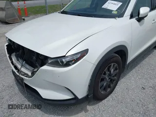 2016 Mazda CX-9 Touring с VIN JM3TCBCY1G0116889, выставлен на аукционе IAAI как лот 42394821 с пробегом 210 861 миль миль и . История ставок и продаж доступна на DreamBid. Изображение 17.
