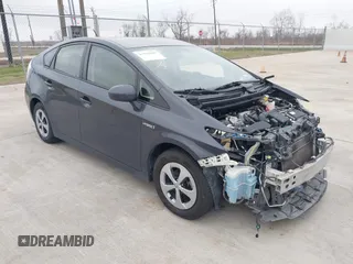 2015 Toyota Prius Four z VIN JTDKN3DU6F1923580, wystawiony jako IAAI lot #41594200 z przebiegiem 181 732 mil mil oraz . Historia ofert i sprzedaży dostępna na DreamBid. Obrazek 1.