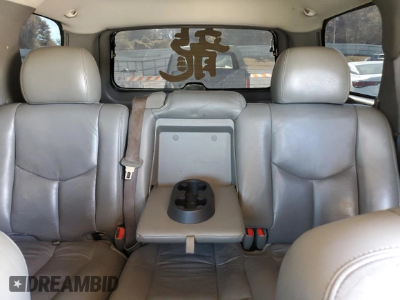 2006 GMC Yukon SLT with VIN 1GKEK13T96J110533, listed as a Copart auction lot 77797364 with 209,339 mi miles and Salvage Title. Bid and sale history available at carsss.com. Image 10.