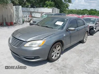 2011 Chrysler 200 Touring with VIN 1C3BC1FG0BN602899, listed as a IAAI auction lot 42118809 with 129,980 mi miles. Bid and sale history available at carsss.com. Image 2.