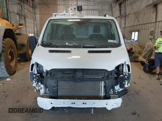 2023 Ford Transit Cargo with VIN 1FTBR1Y86PKA79798, listed as a IAAI auction lot 40155361 with 28,670 mi miles and . Bid and sale history available at DreamBid. Image 11.