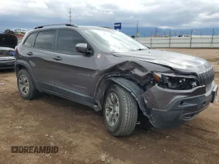 2020 Jeep Cherokee Trailhawk with VIN 1C4PJMBXXLD500953, listed as a Copart auction lot 58761405 with 68,457 mi miles and Salvage title. Bid and sale history available at DreamBid. Image 4.