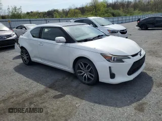 2014 Scion tC z VIN JTKJF5C70E3084697, wystawiony jako Copart lot #54307295 z przebiegiem 174 073 mil mil oraz Szkoda całkowita • Salvage title. Historia ofert i sprzedaży dostępna na DreamBid. Obrazek 4.