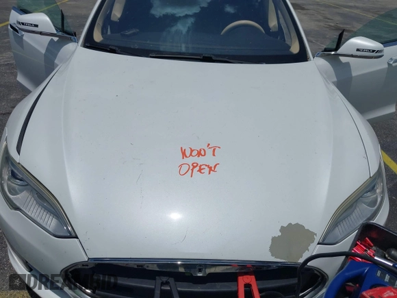 2013 Tesla Model S with VIN 5YJSA1CG4DFP21658, listed as a IAAI auction lot 42398609 with 116,068 mi miles and . Bid and sale history available at DreamBid. Image 10.