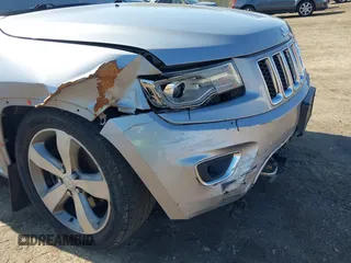 2014 Jeep Grand Cherokee Overland with VIN 1C4RJFCT9EC231840, listed as a IAAI auction lot 42114284 with 170,691 mi miles and . Bid and sale history available at DreamBid. Image 19.