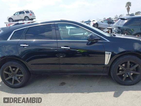 2014 Cadillac SRX Luxury Collection with VIN 3GYFNBE34ES639647, listed as a IAAI auction lot 42108140 with 99,740 mi miles and . Bid and sale history available at DreamBid. Image 14.