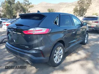 2020 Ford Edge Titanium with VIN 2FMPK3K94LBB10568, listed as a IAAI auction lot 42430196 with 76,490 mi miles and . Bid and sale history available at DreamBid. Image 4.