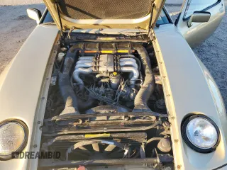 1984 Porsche 928 z VIN WP0JB092XES862382, wystawiony jako Copart lot #79716354 z przebiegiem 117 599 mil mil oraz Szkody całkowita. Historia ofert i sprzedaży dostępna na DreamBid. Obrazek 11.