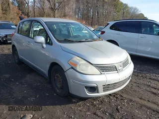 2009 Nissan Versa 1.8 SL with VIN 3N1BC13E19L377436, listed as a IAAI auction lot 41503283 with 149,248 mi miles. Bid and sale history available at carsss.com. Image 1.