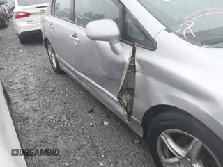 2006 Honda Civic LX with VIN 2HGFA16556H520894, listed as a IAAI auction lot 41963736 with 166,682 mi miles and . Bid and sale history available at DreamBid. Image 6.