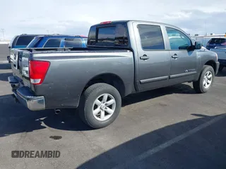 2010 Nissan Titan XE with VIN 1N6BA0EJ5AN304045, listed as a IAAI auction lot 41794718 with 297,551 mi miles. Bid and sale history available at carsss.com. Image 4.