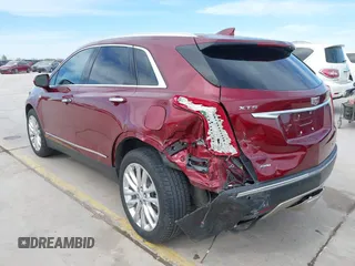 2017 Cadillac XT5 Platinum AWD with VIN 1GYKNFRS9HZ126747, listed as a IAAI auction lot 41810902 with 106,507 mi miles. Bid and sale history available at carsss.com. Image 3.