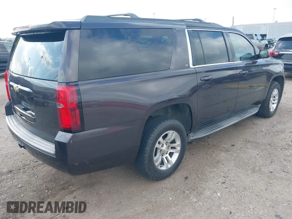 2015 Chevrolet Suburban LT with VIN 1GNSCJKCXFR175154, listed as a IAAI auction lot 42280418 with 227,373 mi miles and . Bid and sale history available at DreamBid. Image 4.