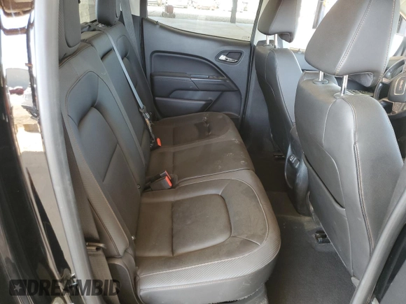 2021 GMC Canyon 4WD AT4 w/Cloth with VIN 1GTG6FEN1M1295551, listed as a Copart auction lot 74900294 with 39,853 mi miles and Salvage Title. Bid and sale history available at carsss.com. Image 10.