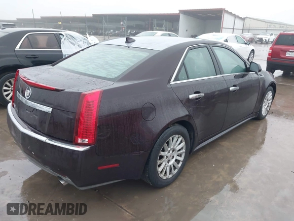 2010 Cadillac CTS Luxury with VIN 1G6DE5EG7A0123935, listed as a IAAI auction lot 41380563 with 182,671 mi miles. Bid and sale history available at carsss.com. Image 4.