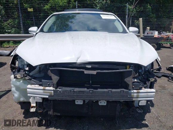 2015 Ford Fusion SE with VIN 3FA6P0HD3FR125456, listed as a IAAI auction lot 42508769 with 143,706 mi miles and . Bid and sale history available at DreamBid. Image 6.