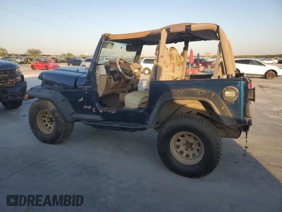 2000 Jeep Wrangler Sport with VIN 1J4FA49S0YP770943, listed as a Copart auction lot 79072624 with 165,377 mi miles and Clean Title. Bid and sale history available at carsss.com. Image 2.