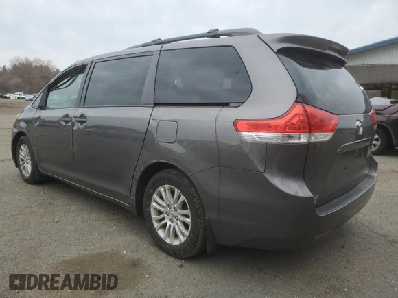 2014 Toyota Sienna XLE with VIN 5TDYK3DC1ES492724, listed as a Copart auction lot 51605245 with 112,079 mi miles and Salvage Title. Bid and sale history available at carsss.com. Image 2.