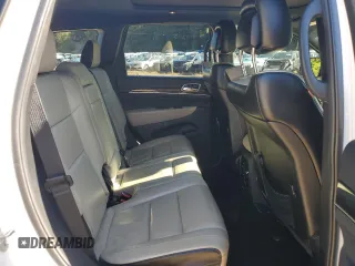 2017 Jeep Grand Cherokee Limited 75th Anniversary with VIN 1C4RJFBG5HC688475, listed as a Copart auction lot 75327564 with 76,830 mi miles and Salvage title. Bid and sale history available at DreamBid. Image 12.