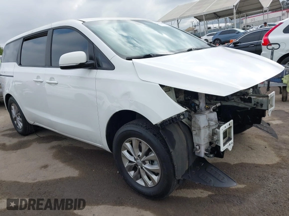 2016 Kia Sedona L with VIN KNDMA5C12G6151168, listed as a IAAI auction lot 42117087 with 99,743 mi miles. Bid and sale history available at carsss.com. Image 1.