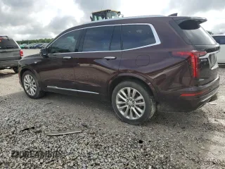 2020 Cadillac XT6 FWD Premium Luxury с VIN 1GYKPCRS9LZ146479, выставлен на аукционе Copart как лот 60662655 с пробегом 88 556 миль миль и Списание • Salvage title. История ставок и продаж доступна на DreamBid. Изображение 2.