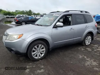 2013 Subaru Forester X Limited with VIN JF2SHAEC9DH424022, listed as a Copart auction lot 63052205 with 118,970 mi miles and Salvage title. Bid and sale history available at DreamBid. Image 1.