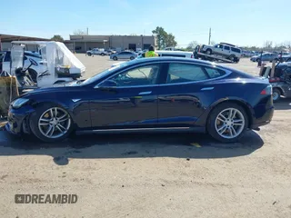 2014 Tesla Model S 60 with VIN 5YJSA1H11EFP47897, listed as a IAAI auction lot 41802285 with Not Provided miles and . Bid and sale history available at DreamBid. Image 15.