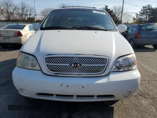 2005 Kia Sedona LX with VIN KNDUP132056685525, listed as a Copart auction lot 77790354 with 60,985 mi miles and Salvage Title. Bid and sale history available at carsss.com. Image 5.