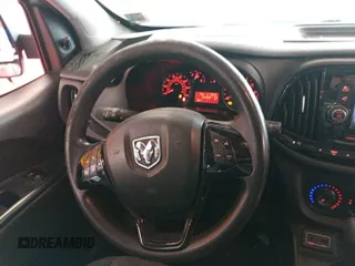 2019 Ram ProMaster City Cargo Tradesman z VIN ZFBHRFAB6K6M61931, wystawiony jako IAAI lot #42570041 z przebiegiem 152 309 mil mil oraz . Historia ofert i sprzedaży dostępna na DreamBid. Obrazek 26.