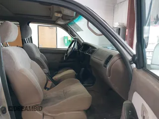 1999 Toyota 4Runner SR5 z VIN JT3HN86R8X0221532, wystawiony jako IAAI lot #41902556 z przebiegiem 406 602 mil mil oraz . Historia ofert i sprzedaży dostępna na DreamBid. Obrazek 5.