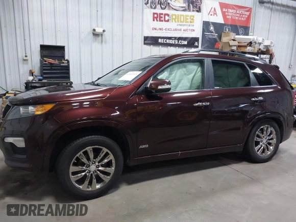 2013 Kia Sorento SX with VIN 5XYKWDA2XDG381984, listed as a IAAI auction lot 41169315 with 144,010 mi miles. Bid and sale history available at carsss.com. Image 14.