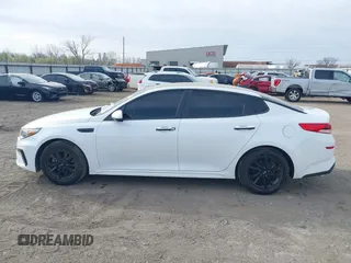 2020 Kia Optima LX with VIN 5XXGT4L33LG432264, listed as a IAAI auction lot 41840702 with 76,194 mi miles and . Bid and sale history available at DreamBid. Image 13.