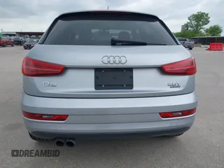 2018 Audi Q3 Premium Plus z VIN WA1JCCFS8JR023281, wystawiony jako IAAI lot #42071289 z przebiegiem 71 335 mil mil oraz . Historia ofert i sprzedaży dostępna na DreamBid. Obrazek 17.