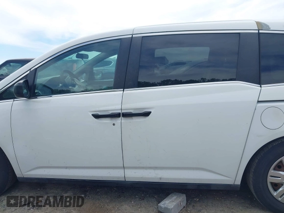2012 Honda Odyssey LX z VIN 5FNRL5H28CB096385, wystawiony jako IAAI lot #42304664 z przebiegiem 105 010 mil mil oraz . Historia ofert i sprzedaży dostępna na DreamBid. Obrazek 14.