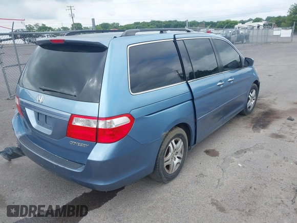 2005 Honda Odyssey EX with VIN 5FNRL38435B101887, listed as a IAAI auction lot 42704893 with 185,137 mi miles and . Bid and sale history available at DreamBid. Image 4.