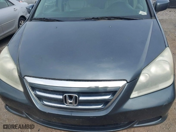 2005 Honda Odyssey EX-L with VIN 5FNRL38765B070922, listed as a IAAI auction lot 41868648 with 192,518 mi miles. Bid and sale history available at carsss.com. Image 6.