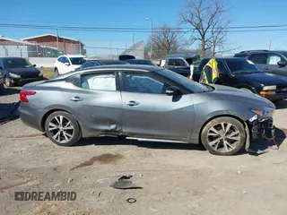 2018 Nissan Maxima SV with VIN 1N4AA6AP4JC388887, listed as a IAAI auction lot 41688858 with 63,678 mi miles and . Bid and sale history available at DreamBid. Image 13.